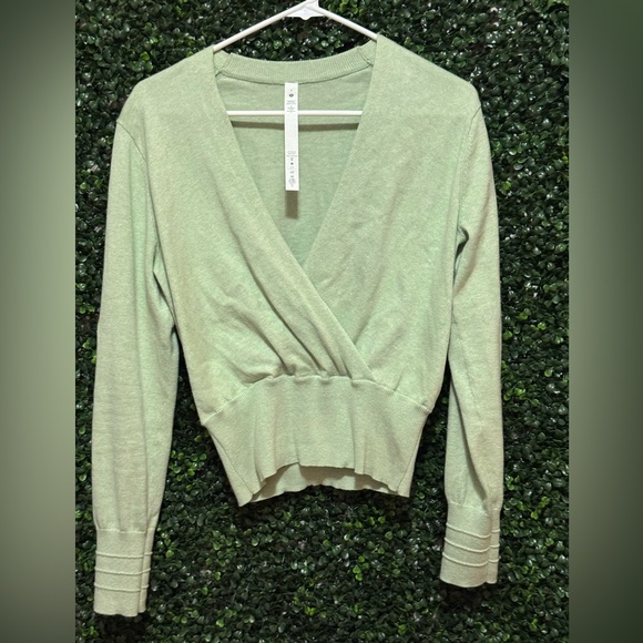Lululemon Crossover Ribbed Waist
Sweater in Heathered Creamy Mint - Picture 6 of 12